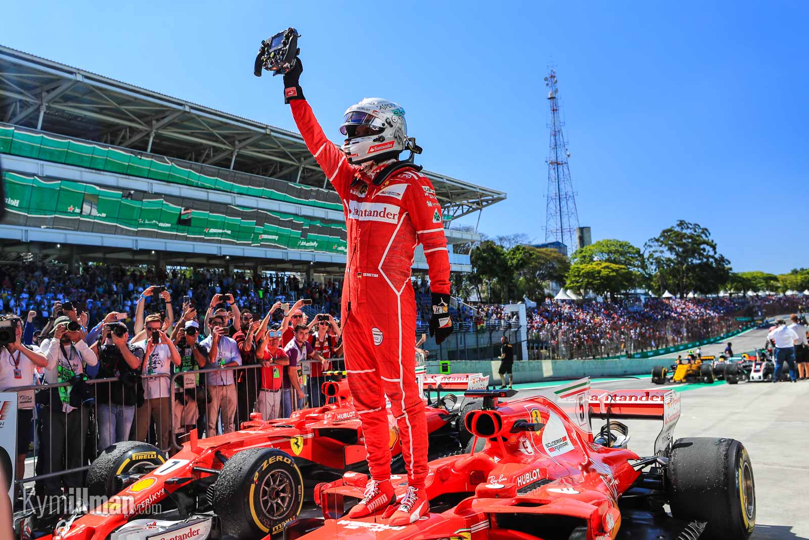 Техники формулы 1. Sebastian Vettel Ferrari. Себастьян Феттель победа. Себастьян Феттель 2017. Сан-Паулу трасса ф1.