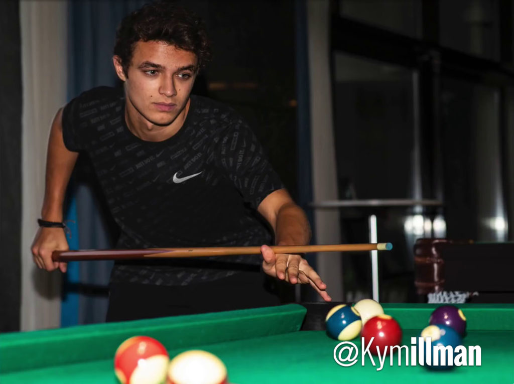 Lando Norris plays pool