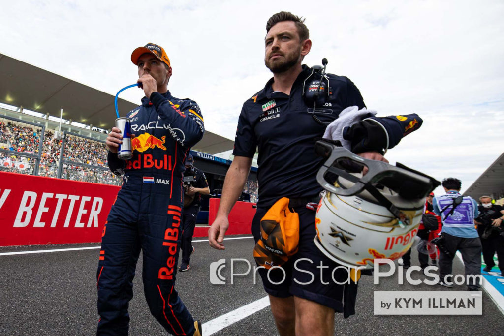 Max verstappen's F1 trainer bradley scanes walking with 2 time F1 World Driver's Champion Verstappen in the F1 paddock