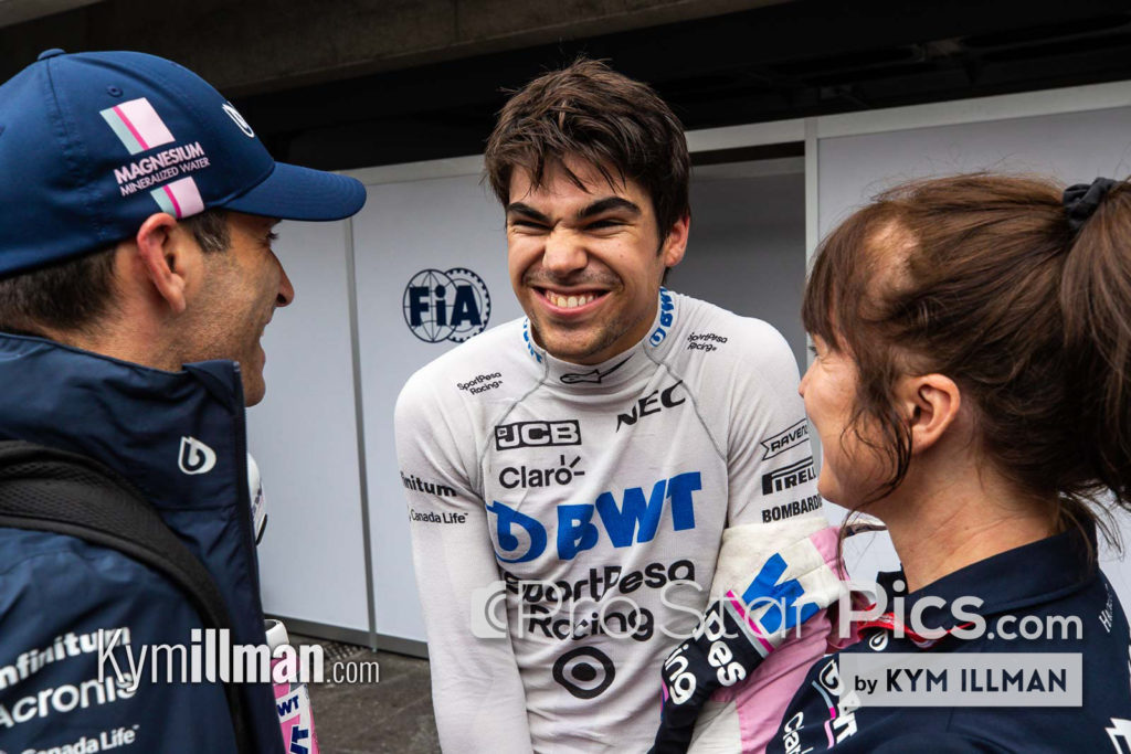 lance Stroll's f1 trainer Henry Howe celebrating