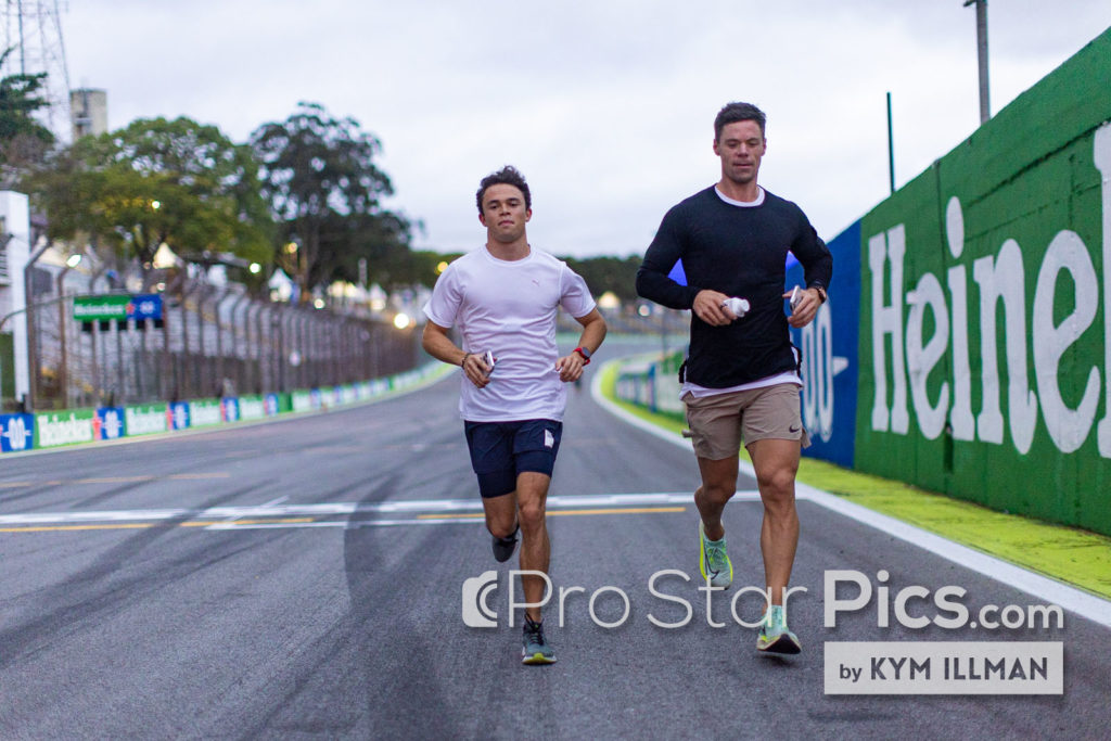 Nyck de Vries' F1 trainer Pyry Salmela running on Brazilian F1 circuit