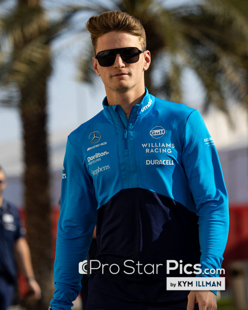 Amercan F1 driver Logan Sargeant walks in the F1 paddock