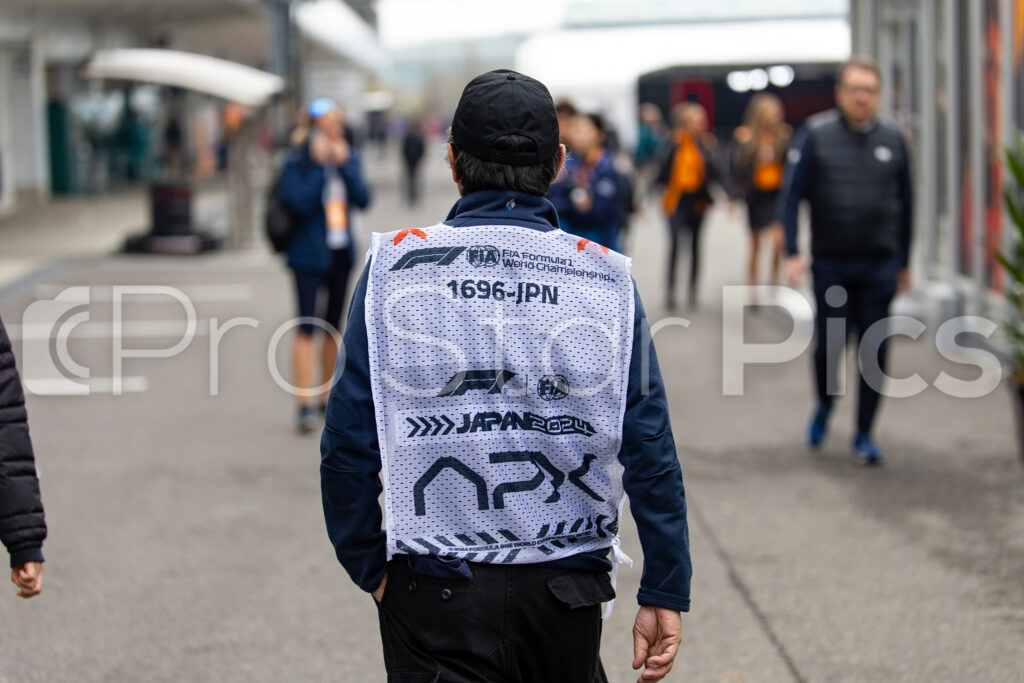 Apx F1 movie crew with custom tabards. F1 movie behind the scenes