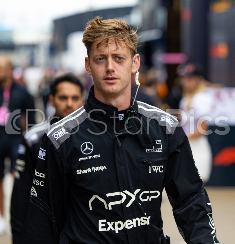 APX GP race suits in the paddock during F1 movie behind the scenes in Silverstone 2023