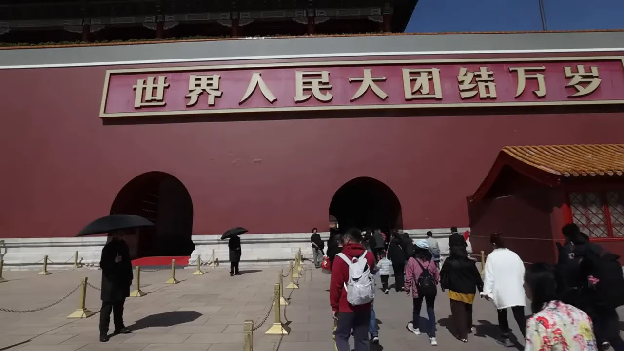 Visitors queueing near an entrance at Tiananmen Square in Beijing