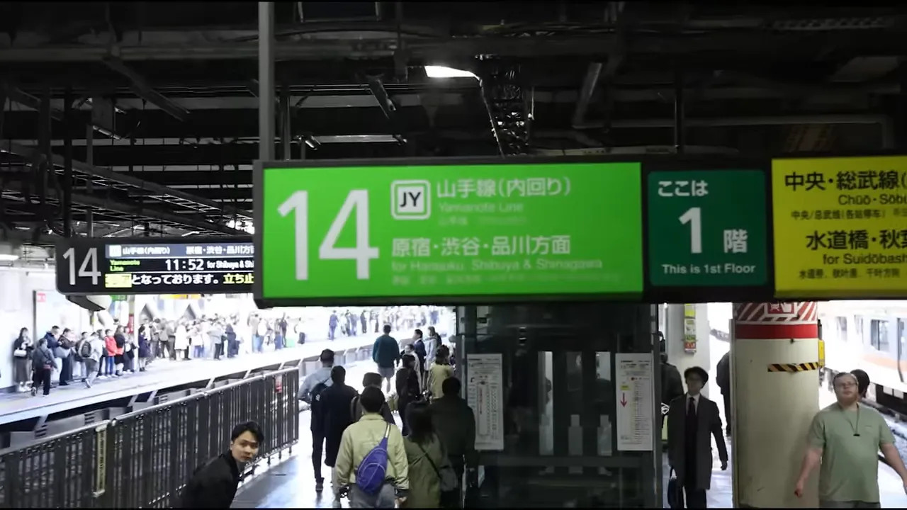 Wayfinding signs inside a Tokyo train station platform