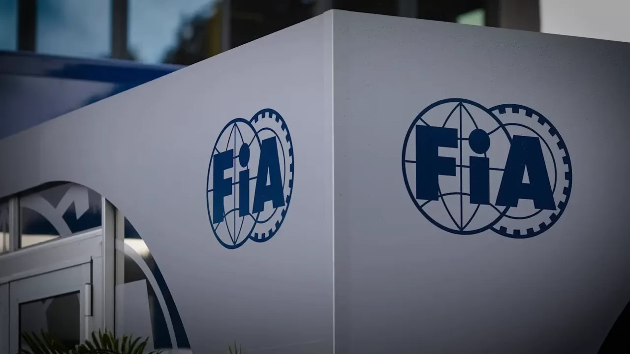 FIA logo printed on a white panel at a venue