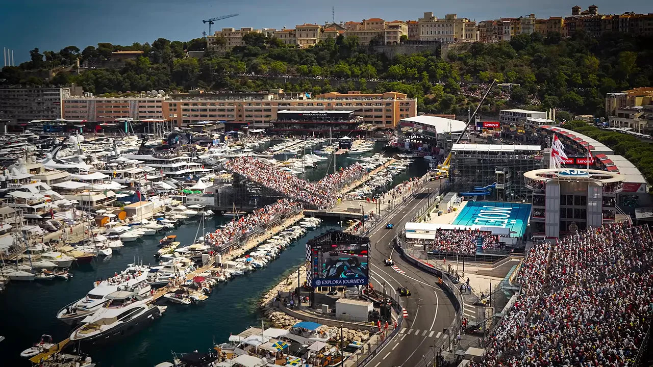 Aerial view of Monaco harbour, yachts, grandstands and the Formula 1 circuit