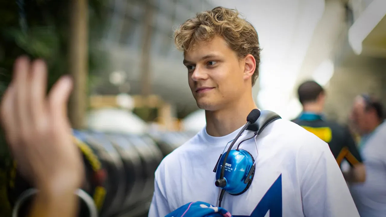Young race driver in the paddock with a headset during Miami weekend