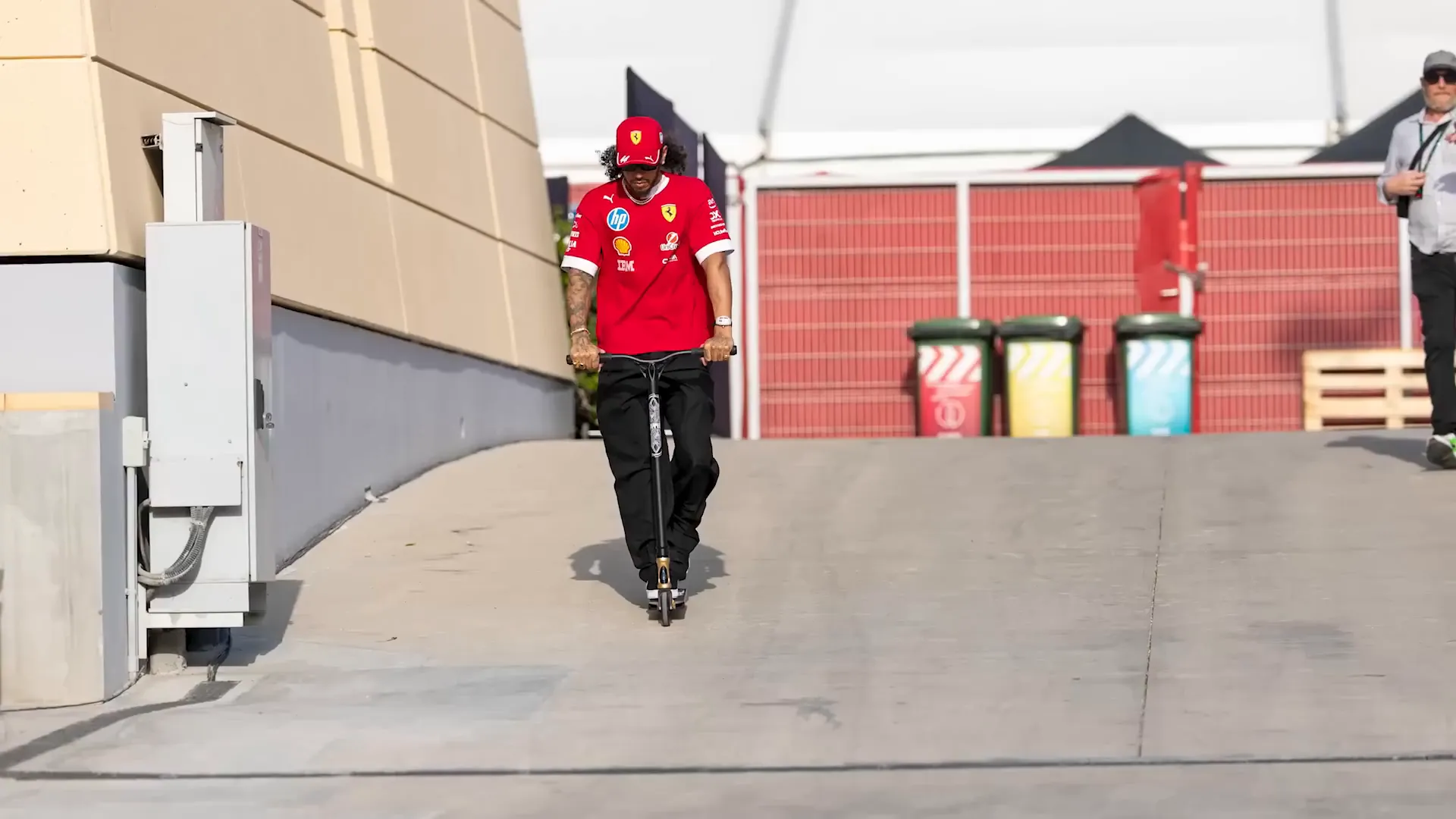 Lewis Hamilton navigating the paddock