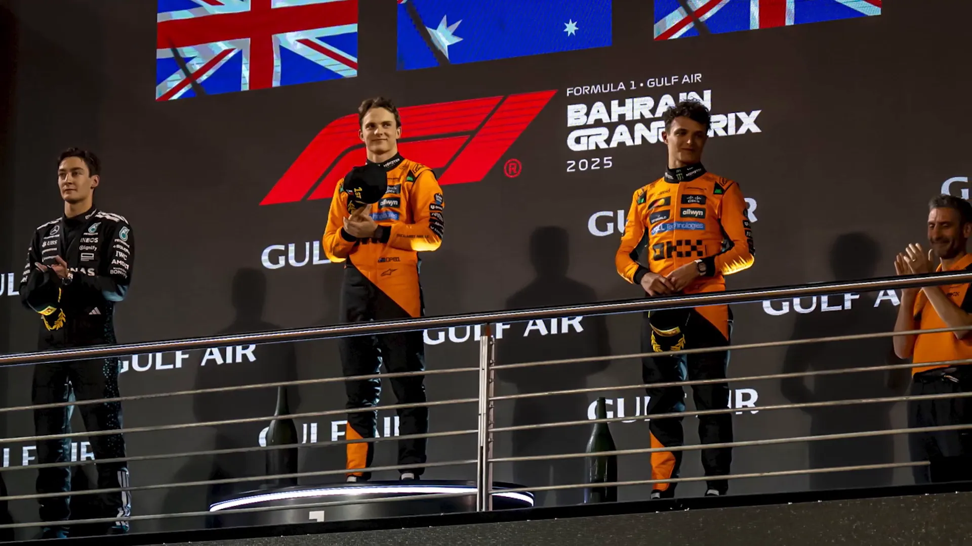 Oscar Piastri on the podium celebrating his victory