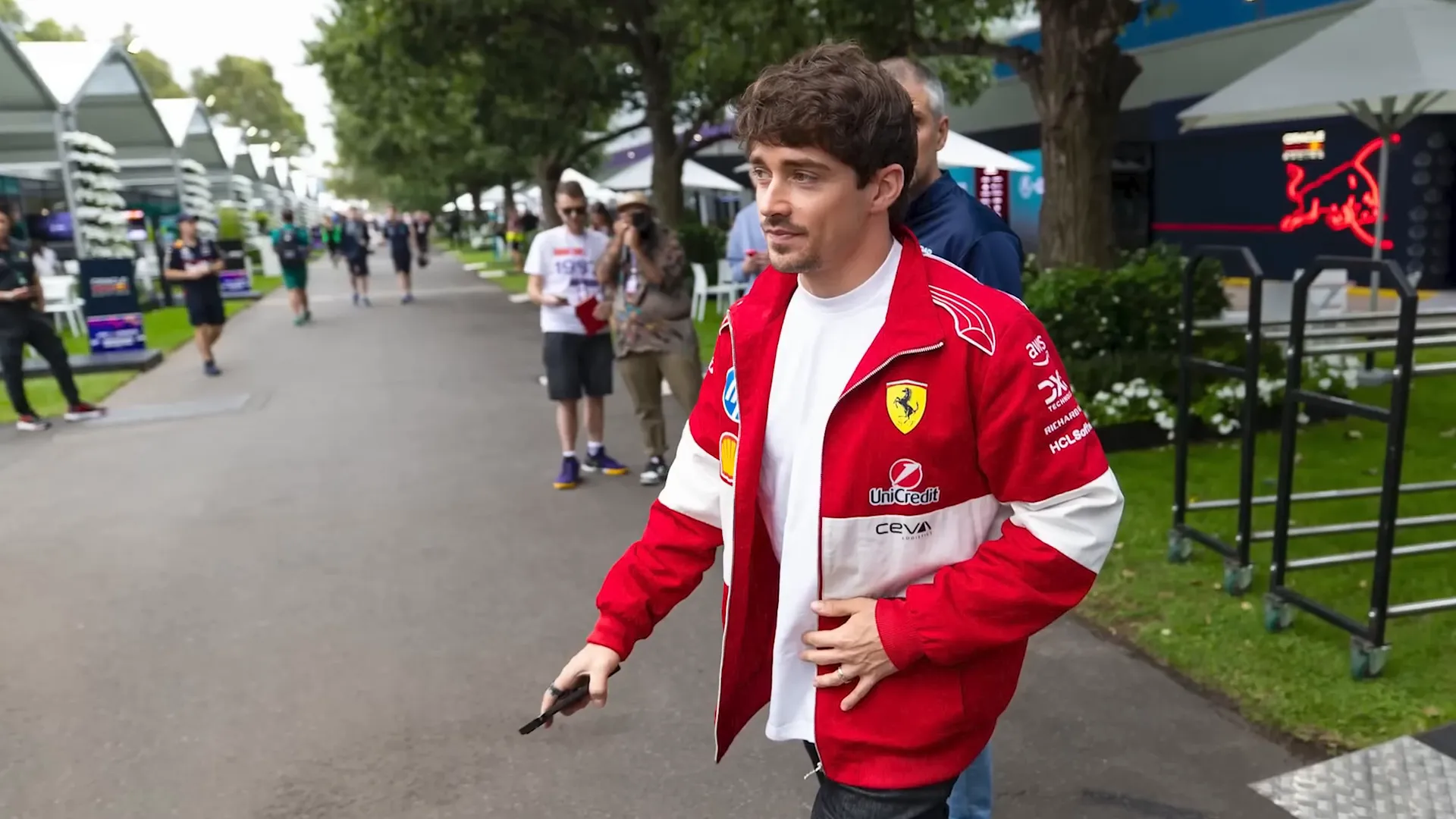 Paddock with drivers arriving