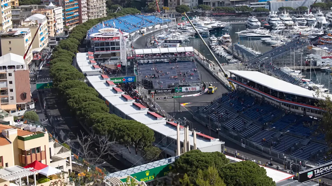 Aerial view of Monaco circuit and harbor with grandstands and paddock buildings
