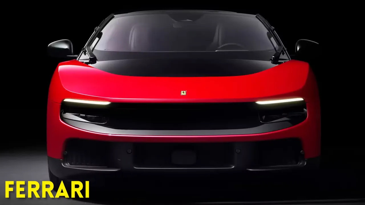 Front view of red Ferrari Luce against a black background