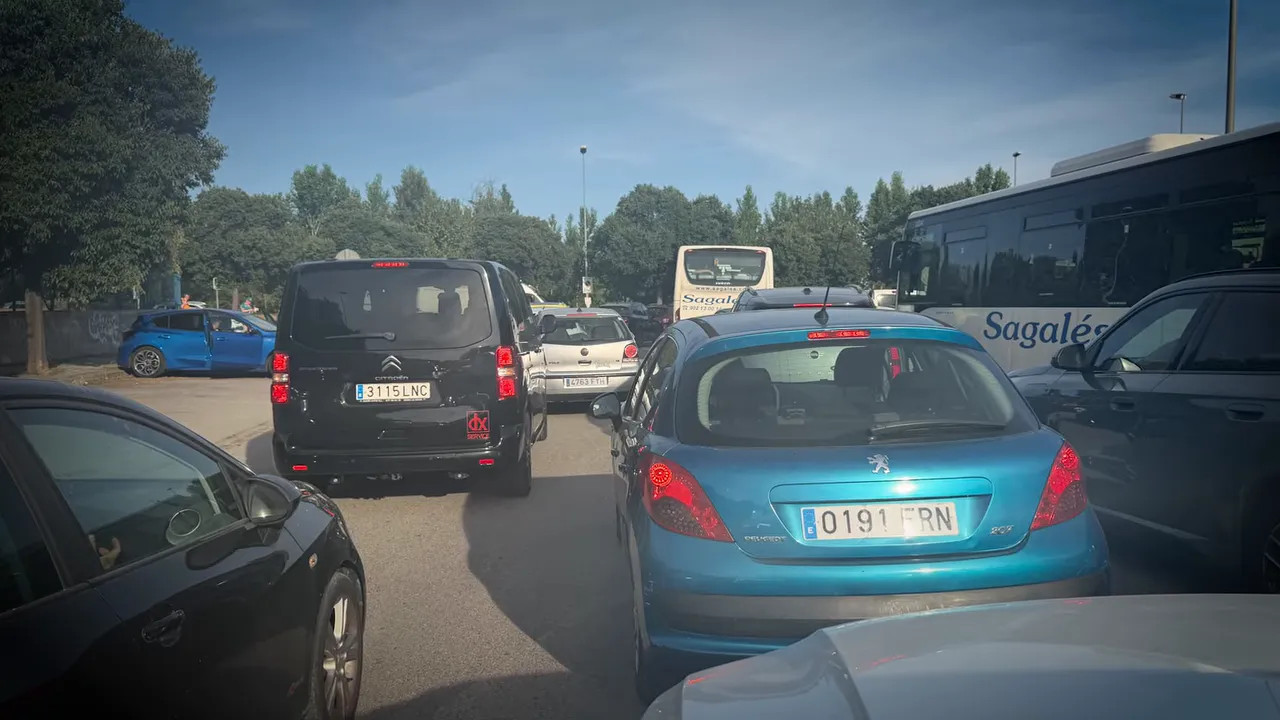 Heavy traffic jam with cars and buses on the road outside the circuit