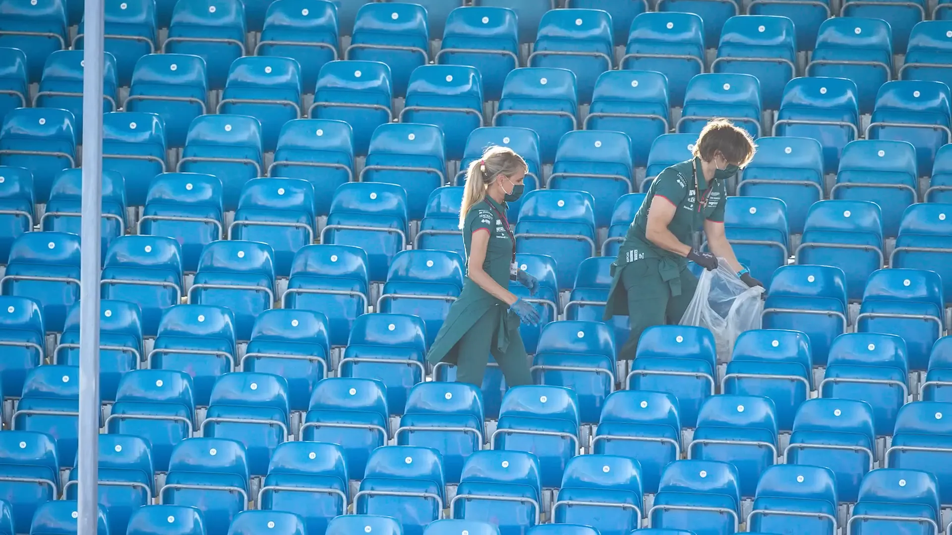 Sebastian Vettel picking up rubbish