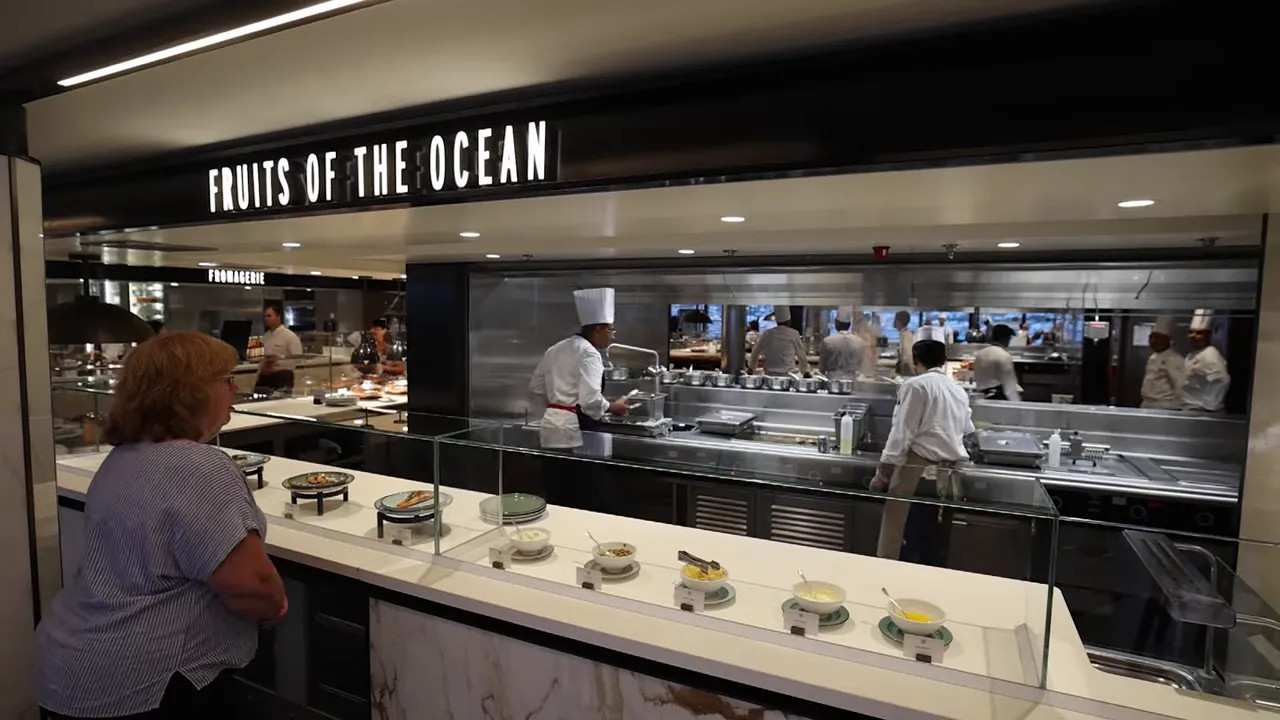 Emporium Marketplace food station labelled Fruits of the Ocean with crew behind the counter
