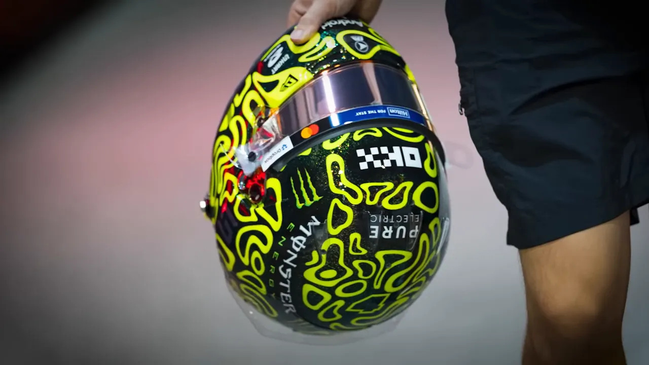 Darker helmet used by a driver that 'pops' under lights
