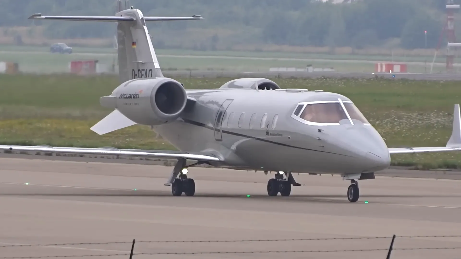 Lando Norris arriving on Learjet 60