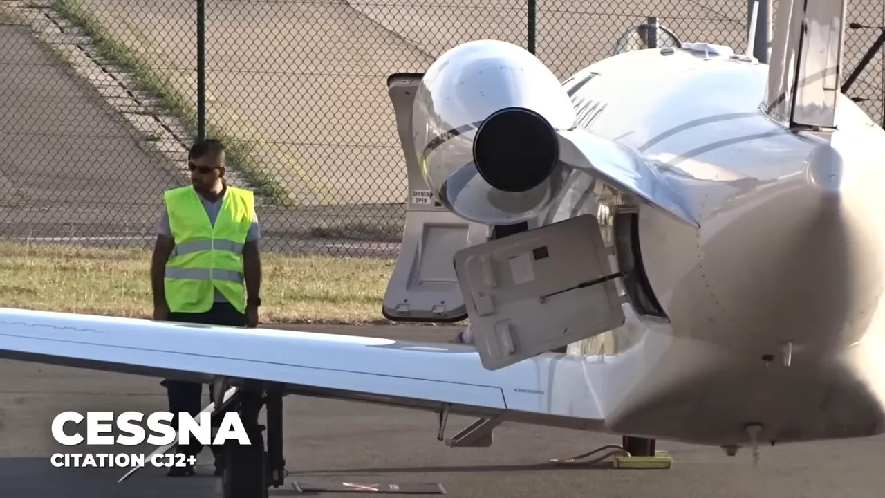 White Cessna Citation CJ2+ parked on the Liège Airport apron