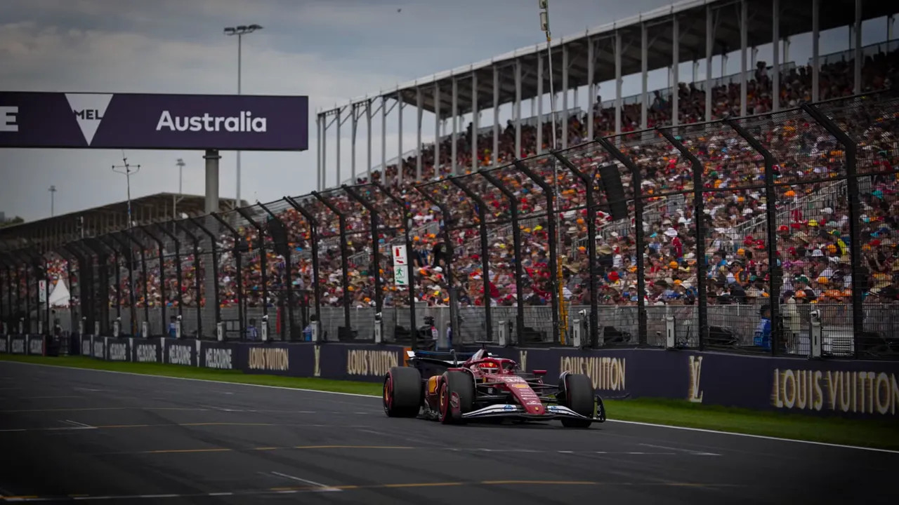 F1 car on the Albert Park track with packed grandstands and an 'Australia' sign overhead
