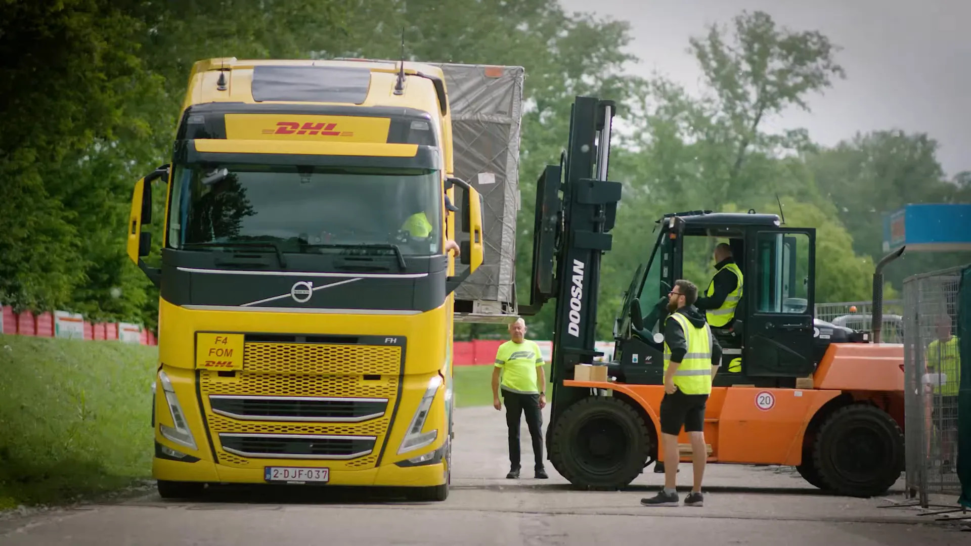 Sea freight containers and logistics partner trucks ready for international shipping