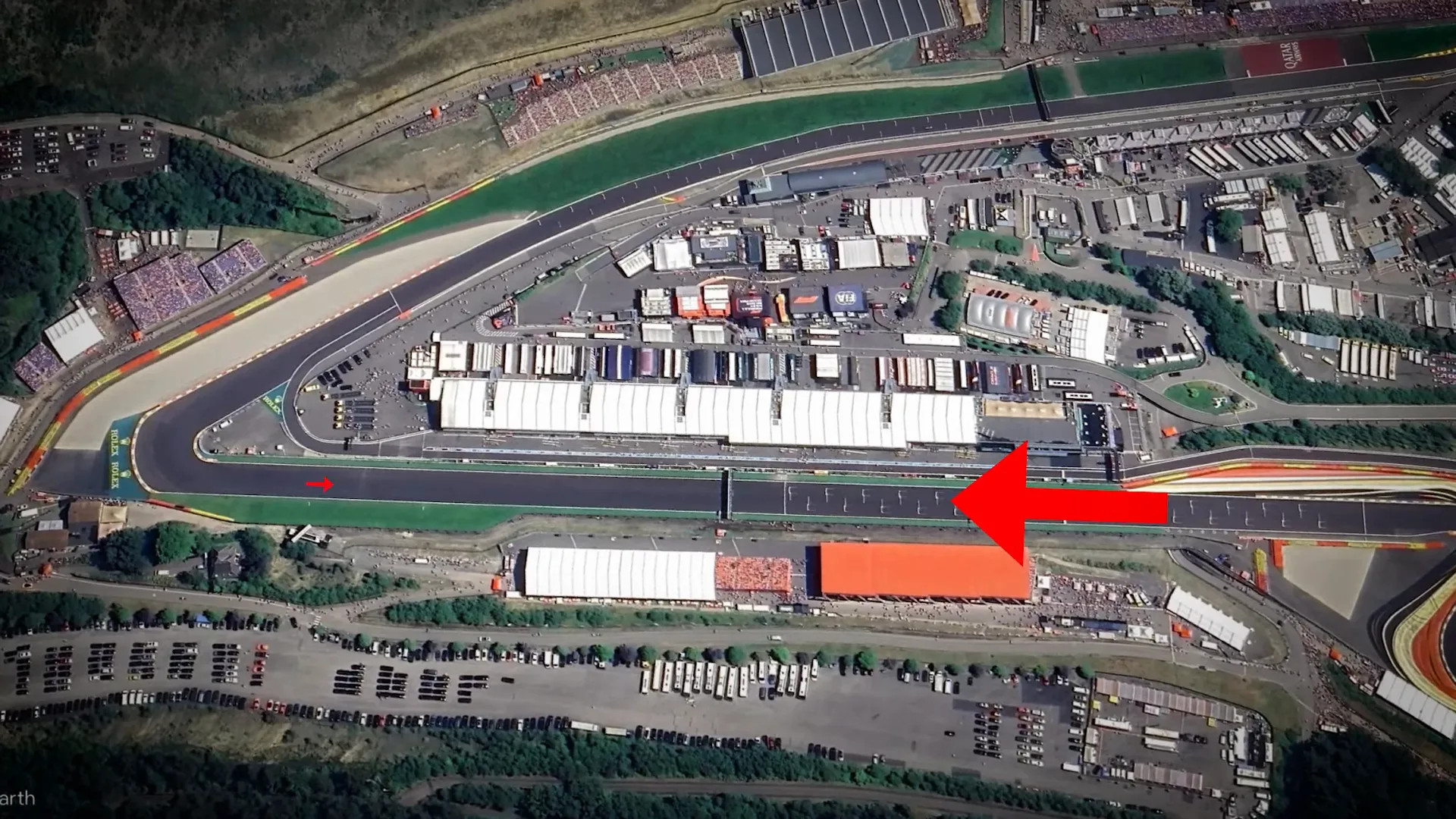 Transporters moving through holding areas towards pit lane after clearance