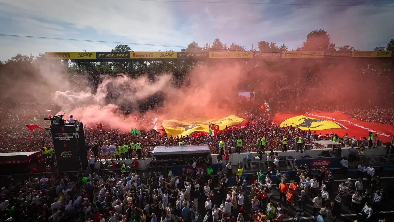 Crowd and fireworks at the Australian Grand Prix with F1 banners in the background