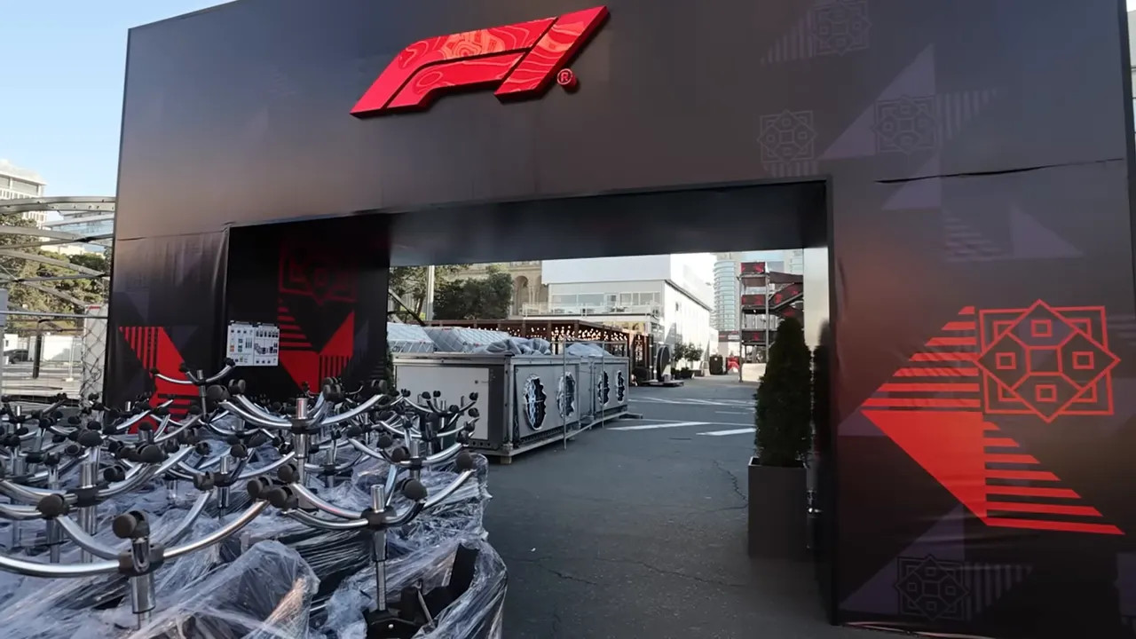 Stacks of chairs left near the media centre entrance awaiting storage