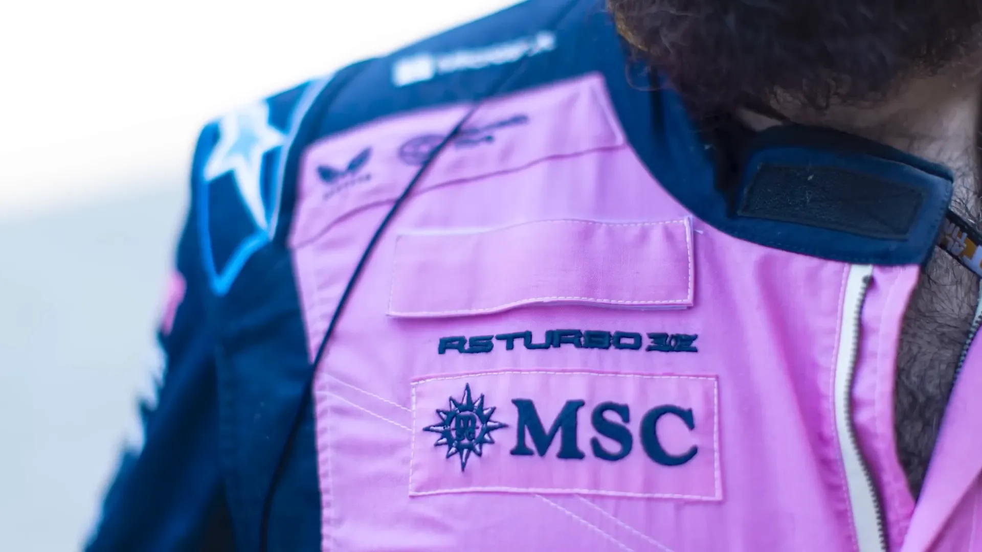 Conflicting sponsor patches on a car