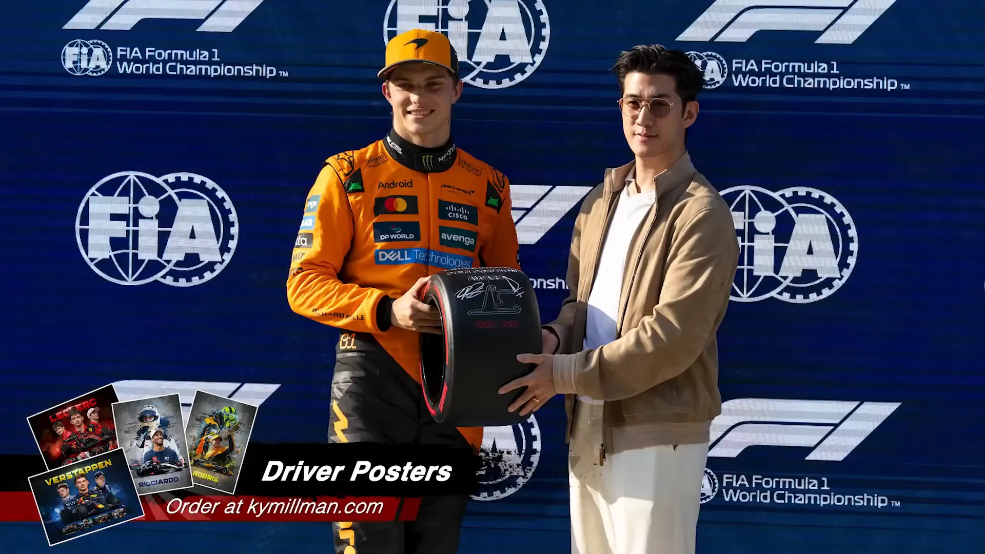 Oscar Piastri celebrating on the podium