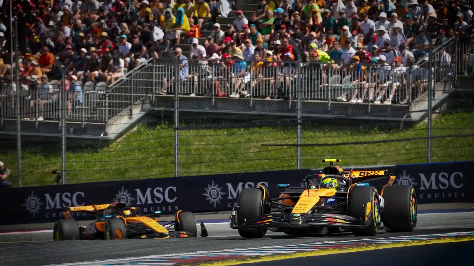 F1 drivers competing on track