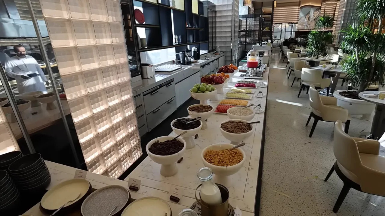 Fairmont Doha breakfast buffet with fruit and hot food stations