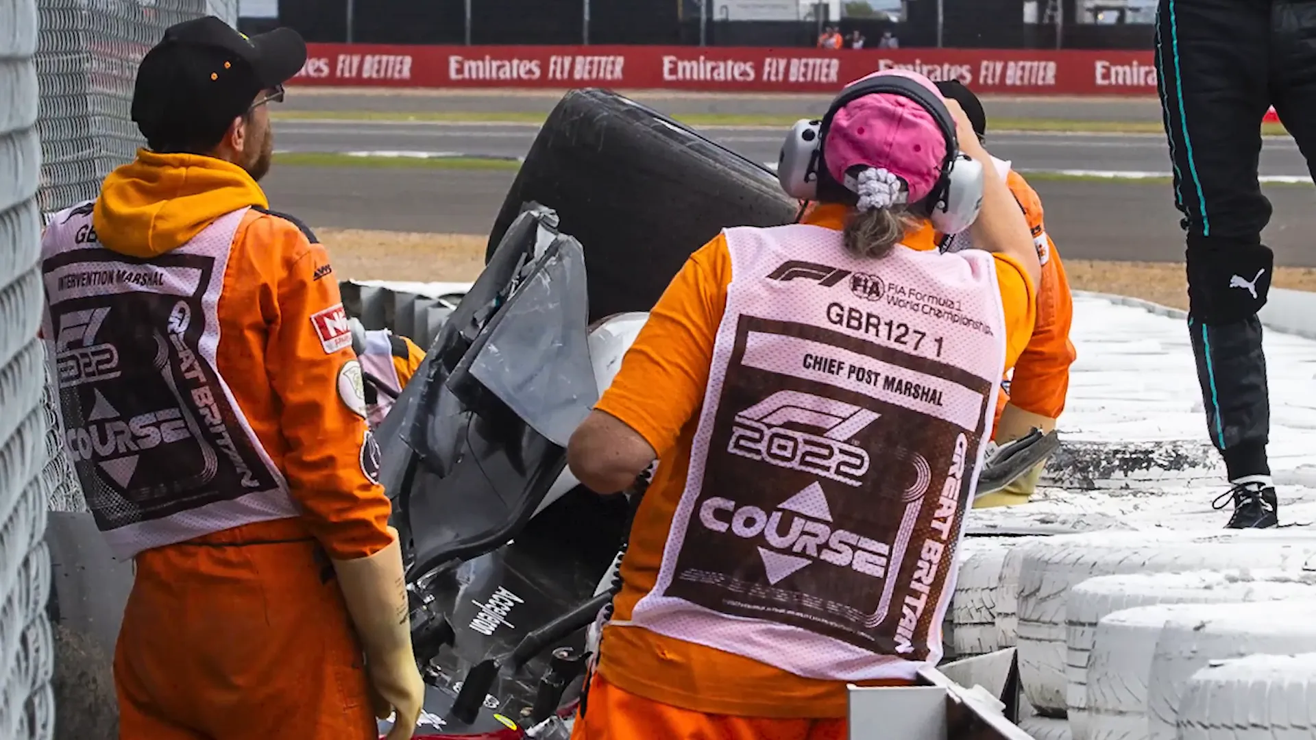 Zhou Guanyu's crashed car resting near the barriers at Silverstone