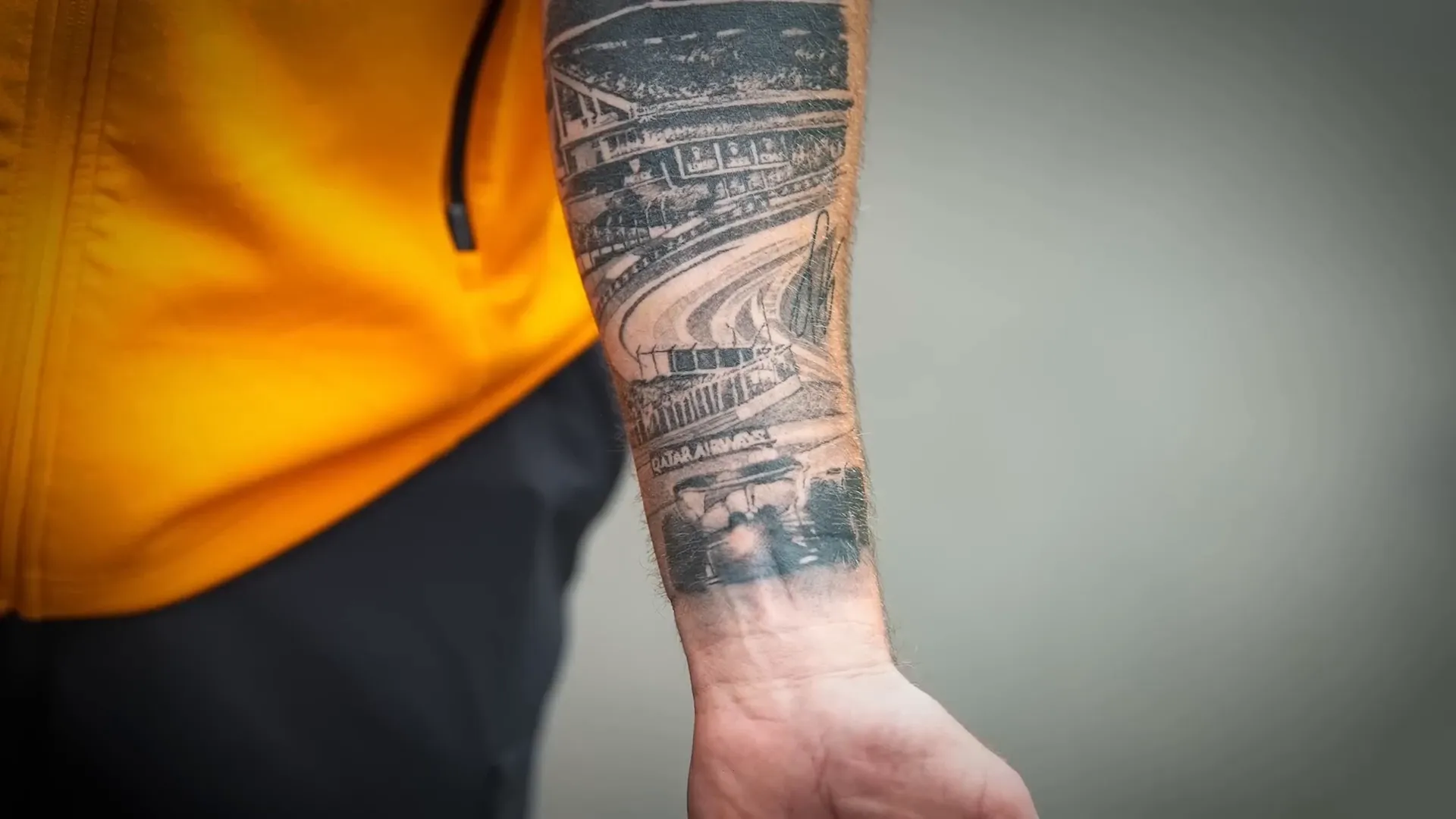 Sid MacLean's tattoo inspired by a Spa photo, signed by Oscar Piastri