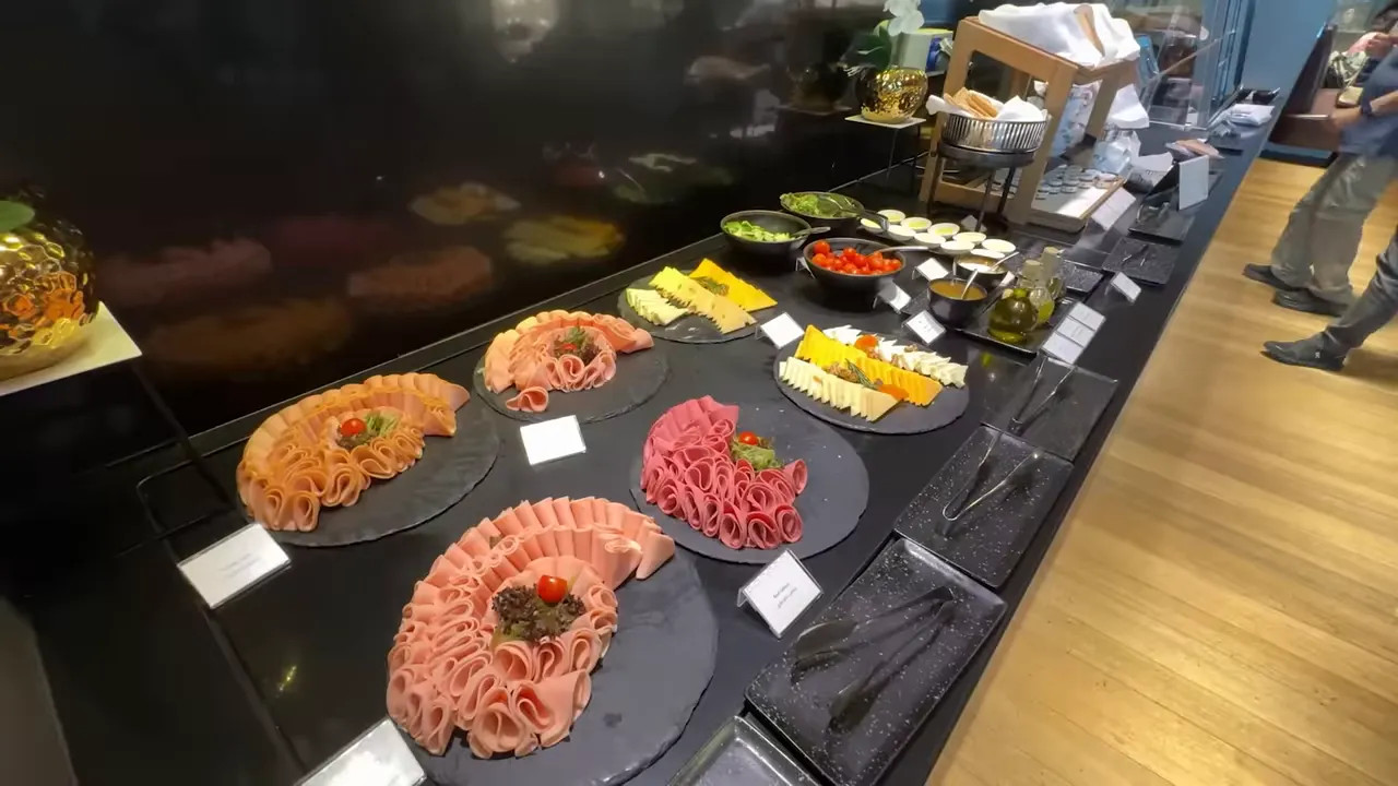 Hamad lounge buffet with arranged cold cuts and cheese platters