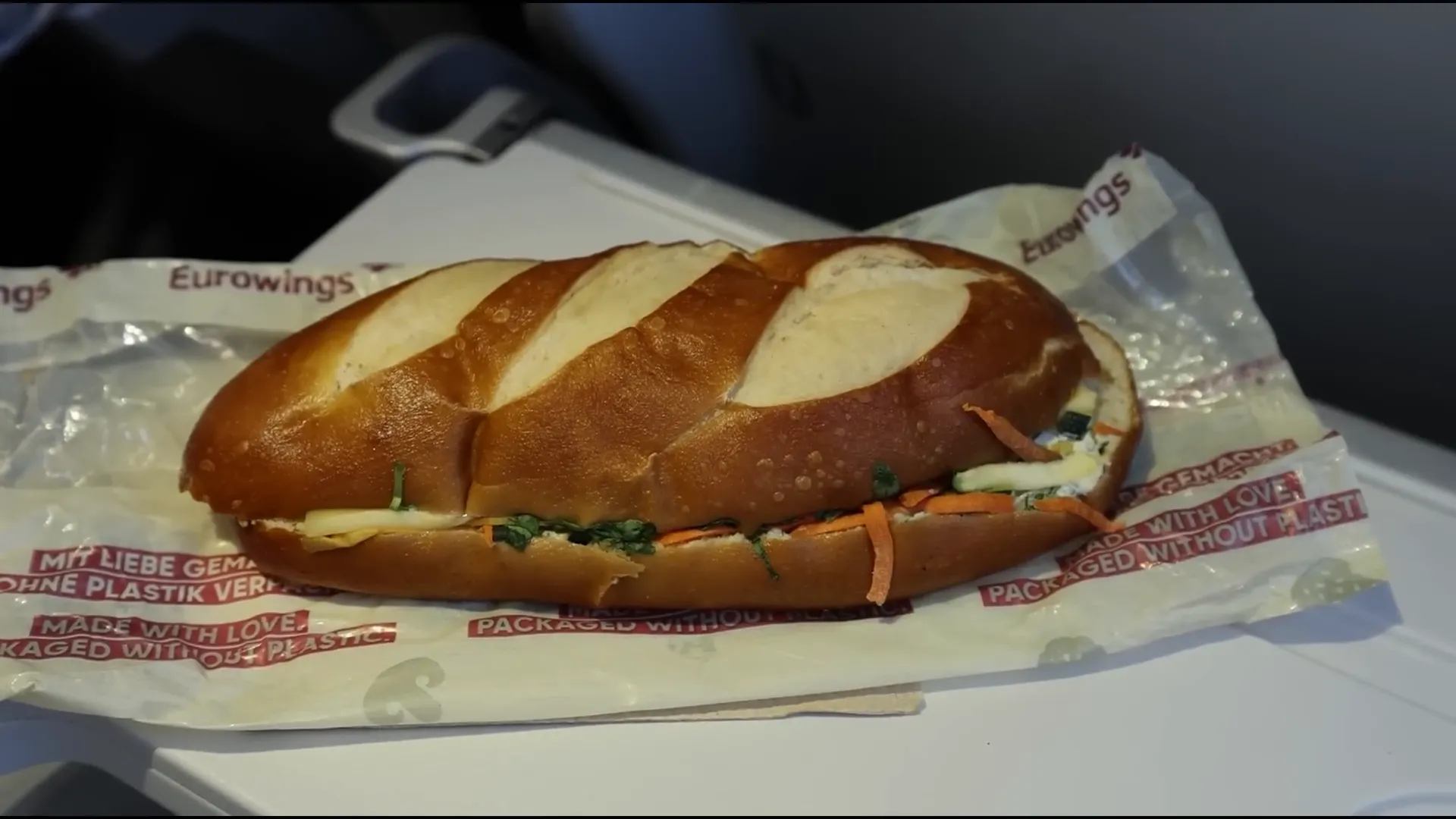 Pretzel roll with cream cheese and gouda on Eurowings flight