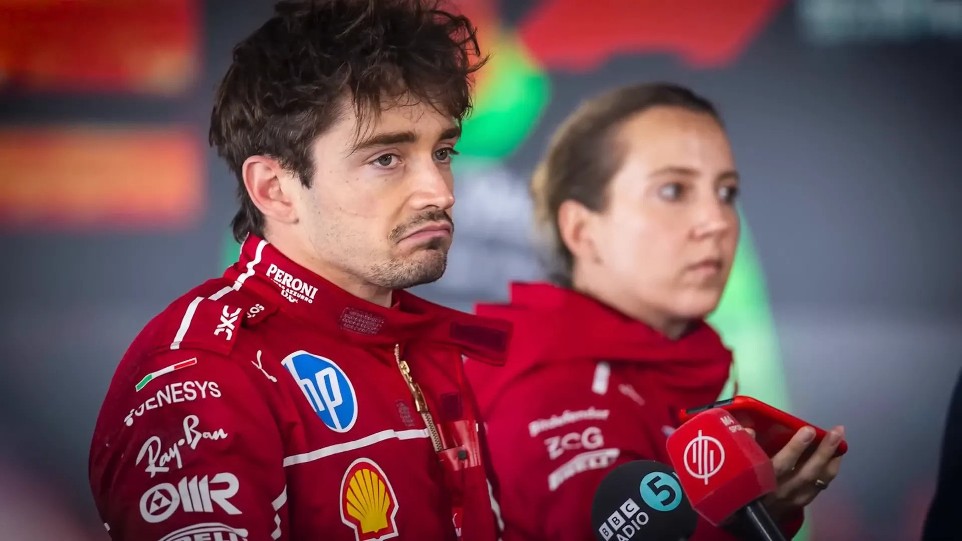 F1 driver facing media and fan attention after a tough race