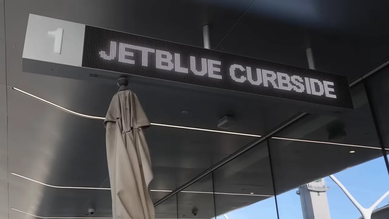 JetBlue curbside sign above the check in area