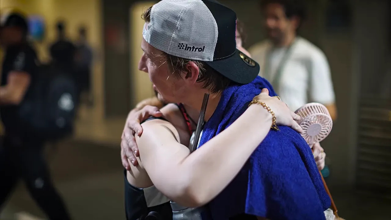 Liam Lawson embracing his sister after the race