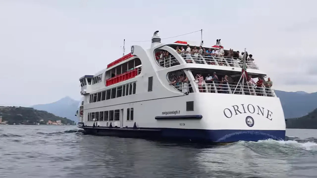 Large Lake Como passenger ferry named Orione on the water