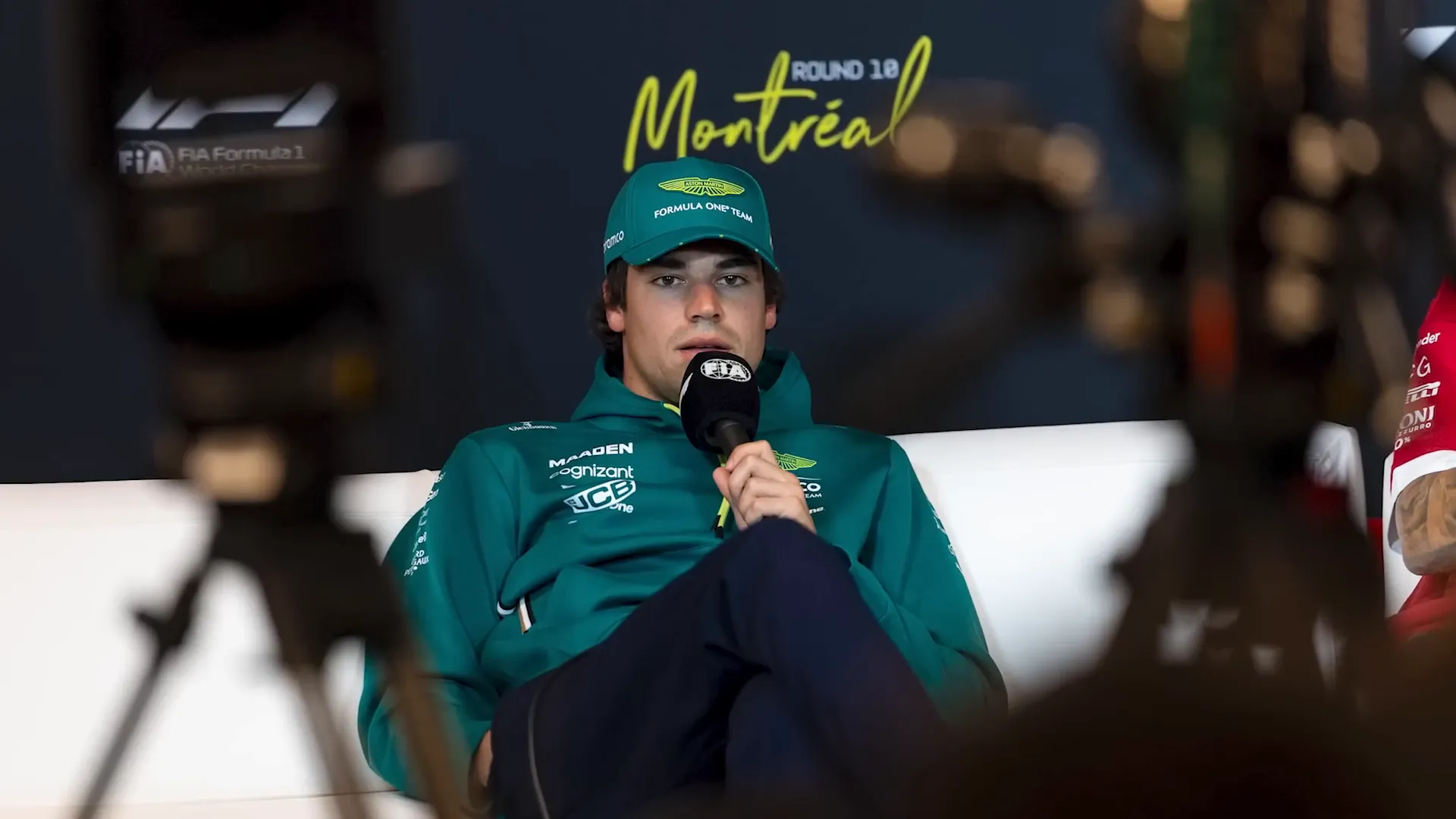 Lance Stroll entering the track with his hand in his pocket.