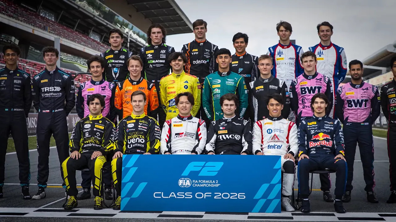 Group photo of the Formula 2 class of 2026 with drivers around a sign