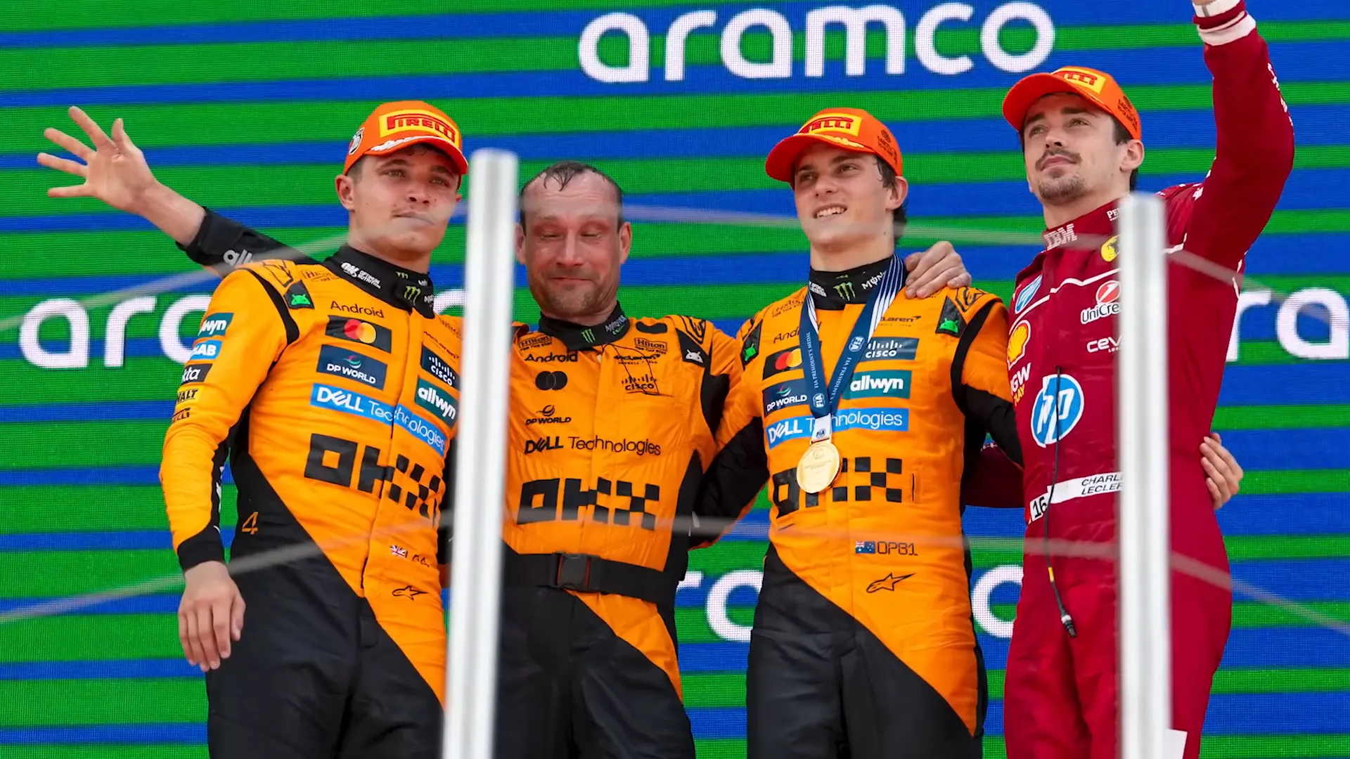 McLaren team celebrating after a successful race.