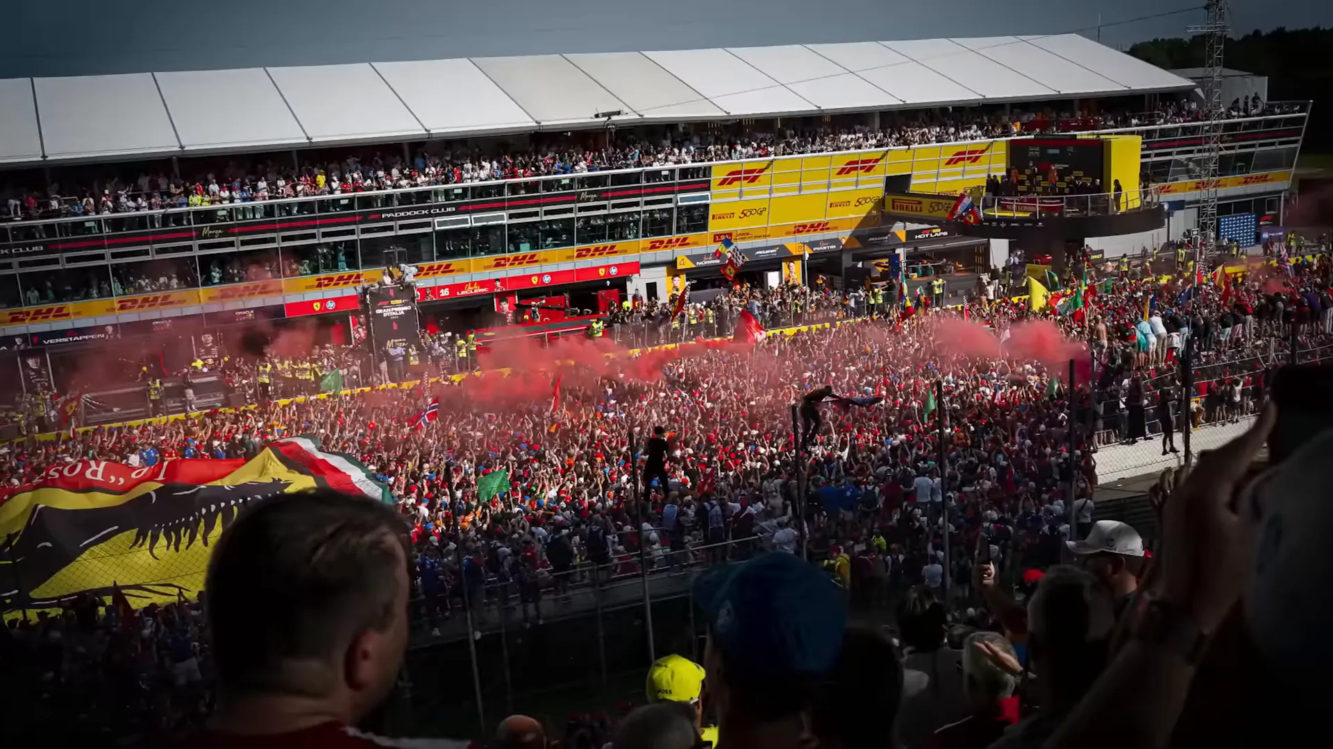 Crowded fans gathered outside the Ferrari garage during the Monza post-race track invasion