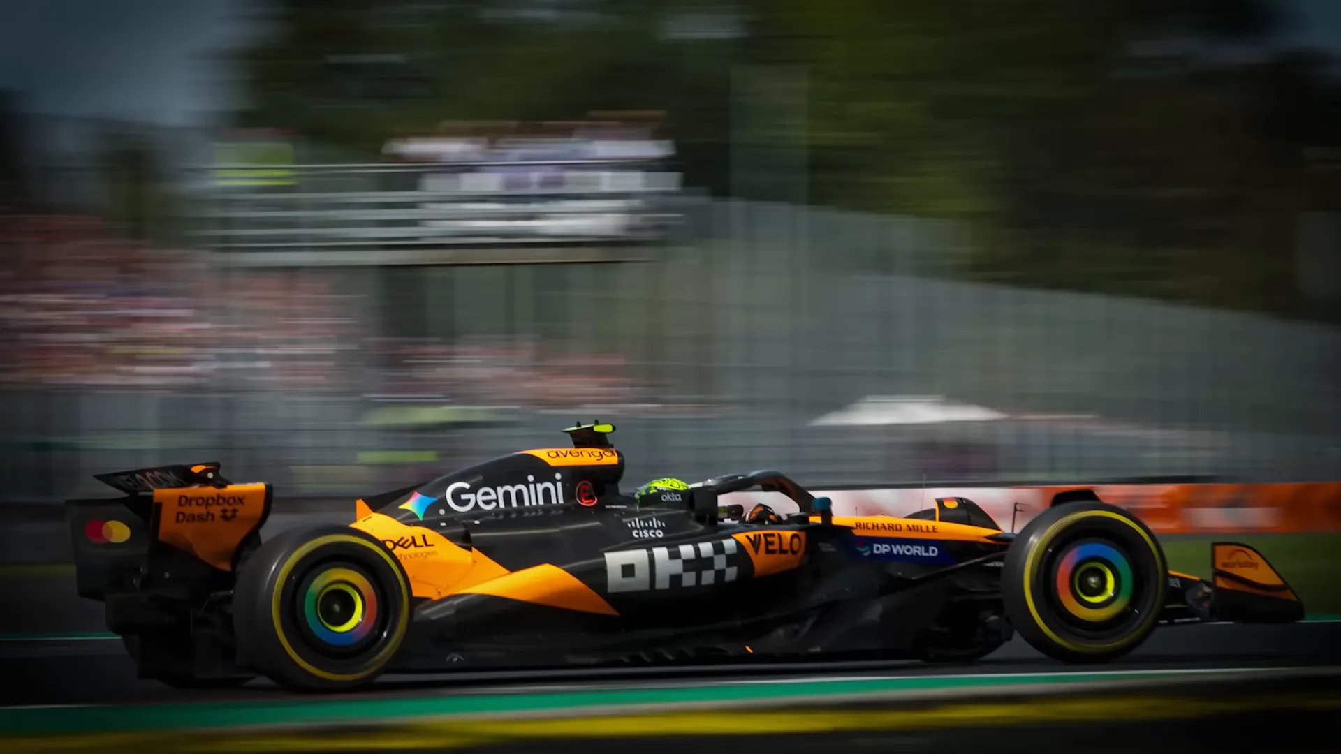 McLaren cars battling on track after the Monza pit stops