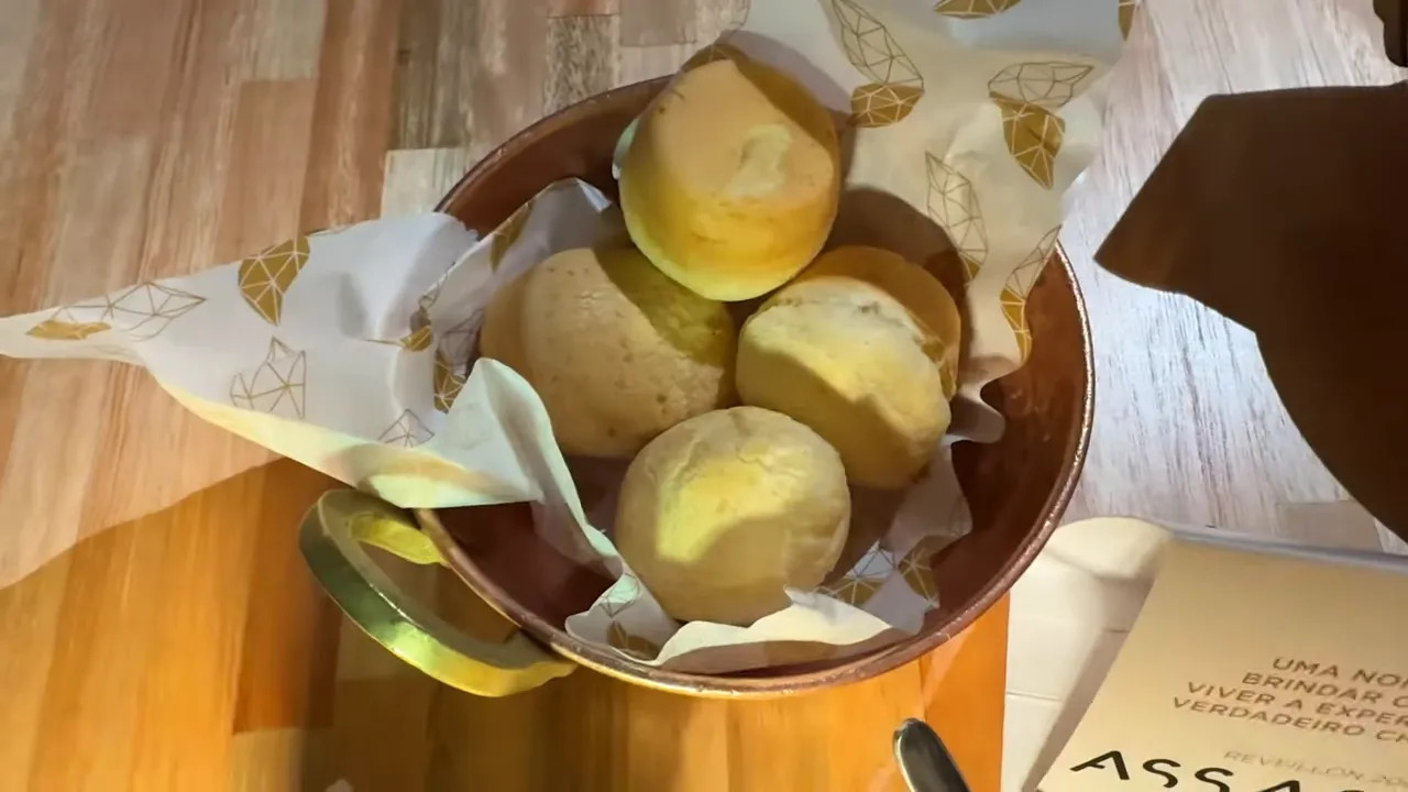 basket of pao de queijo (Brazilian cheese bread) on a table