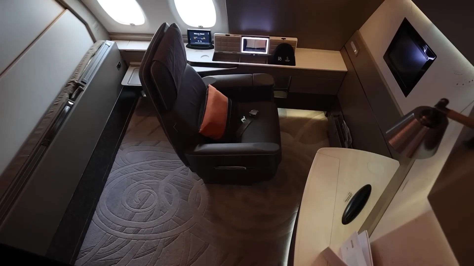 Final views of the Suites cabin as the aircraft descends toward destination
