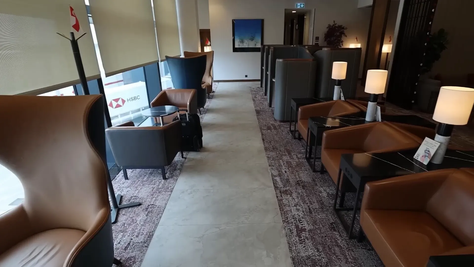 First class lounge seating area with panoramic apron views