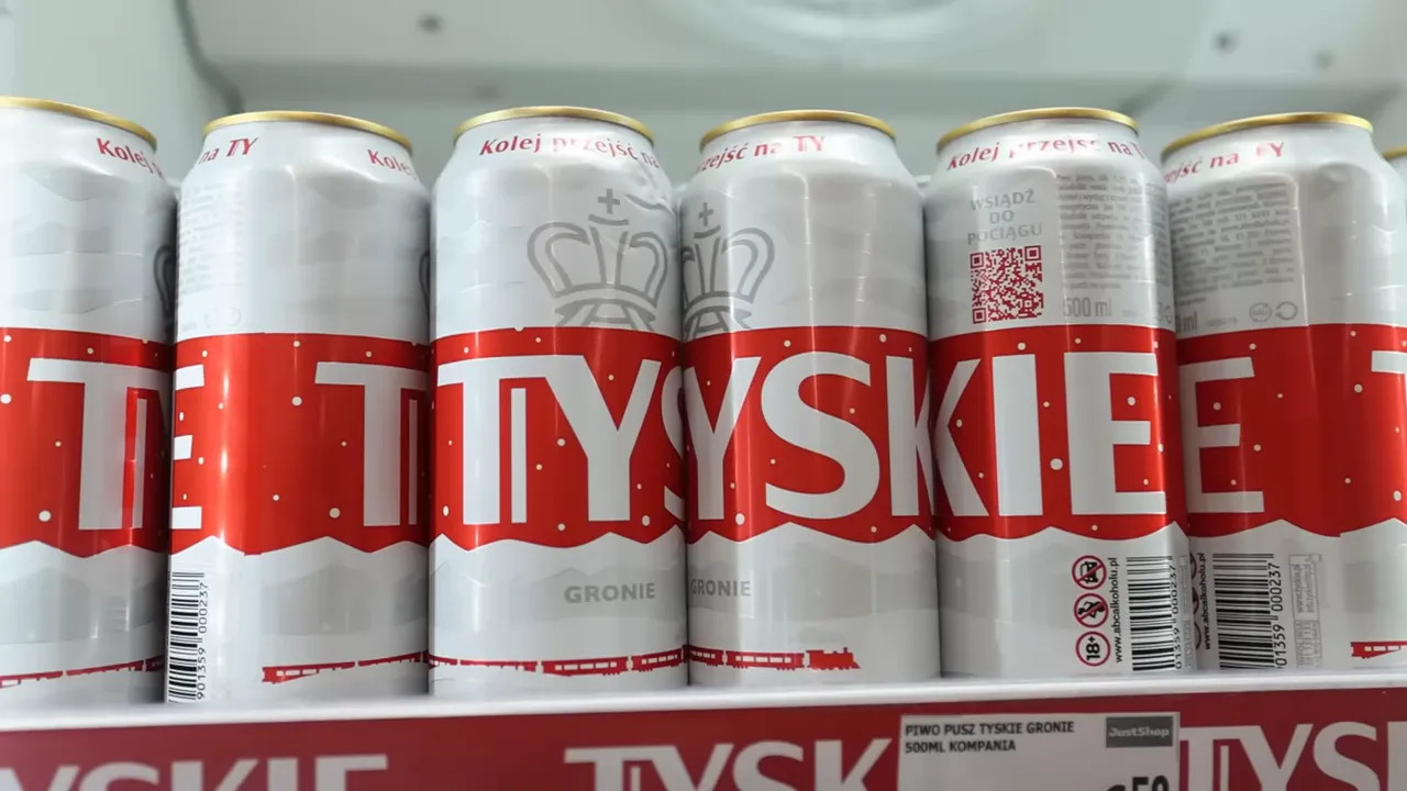 close up of Tyskie beer cans on a store shelf